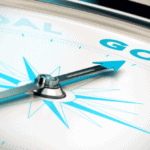 partial view of a compass pointing toward the word goal, depicting the culmination of smarter goals